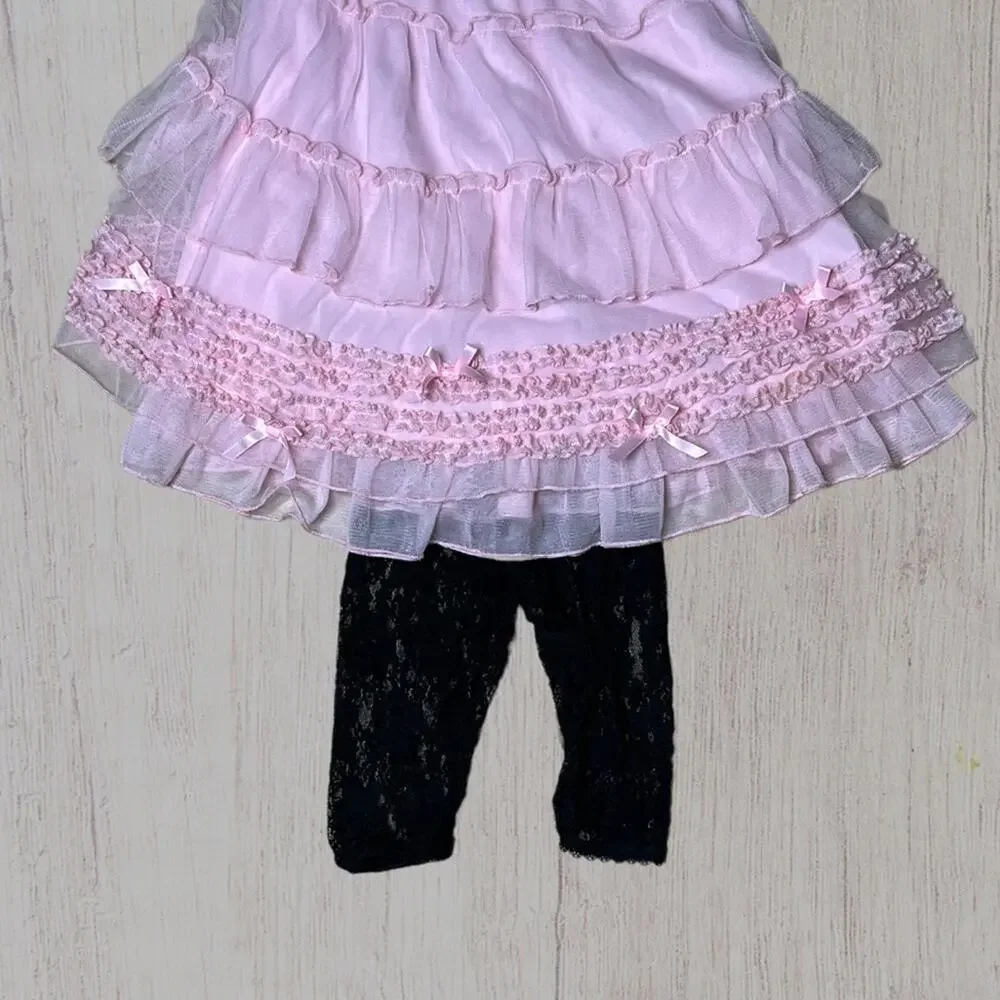 Kate Mack costume ruffled dress with black lace leggings & feather headpiece